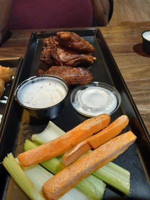 This is their 1/2 order of Wings.Celery wilted. Carrots are hard and old. Wings were dry, cold, tough and chewy