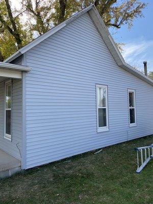 Vinyl siding repair from hail damage.