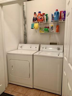 Great laundry room inside apartment.