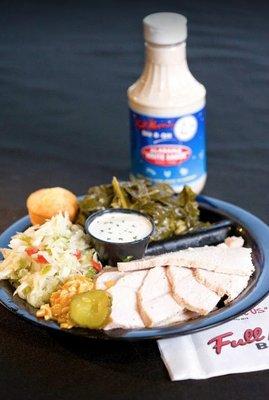 Hickory smoked turkey plate with tangy coleslaw and collard greens.