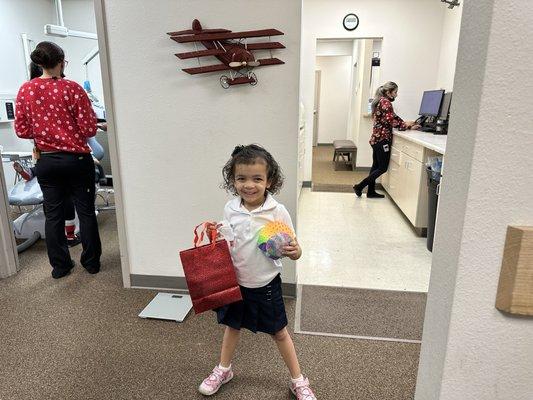 They gave her a gift bag and toys for her first checkup! Second visit a little "stuffy" who's her best pal!