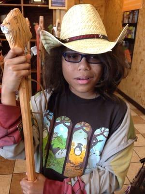 Animal head walking sticks. Why? And so many straw cowboy hats!