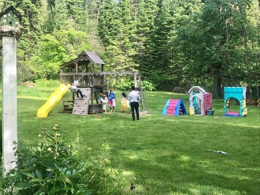 Kids play area across from dance floor and in front of main house