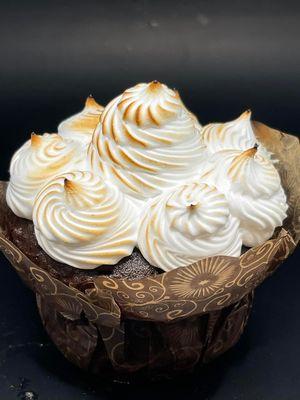 Home-made chocolate cupcake topped with house-made meringue frosting