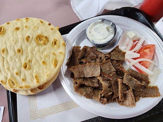 Gyro Plate, extra pita.  Notice the 2 tomatoes, onions, and the piece of feta... or lack thereof.