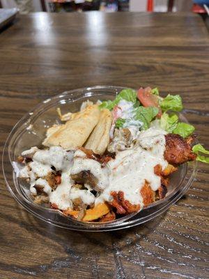 The Halal Kingz chicken and lamb over rice bowl.  (I actually already ate a third of it before I thought to take a photo).