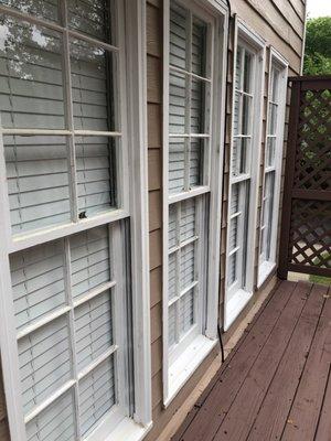 BEFORE - old, rotten windows that would not shut all the way without stuffing stuff in the locks.