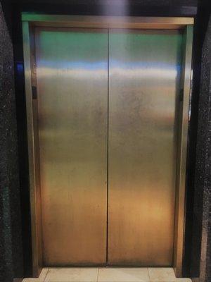 Existing Bronze Elevator Entrance