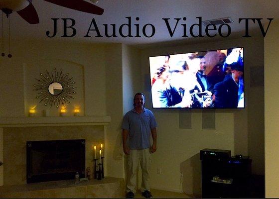 JB and a 75" flat screen