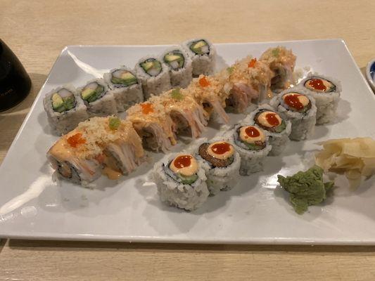 California roll, Itzmi spicy roll and salmon spicy roll all accompanied by Mizo soup and a salad.