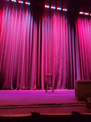 The stage, rumbling with cheers, right before Nate Bargatze came out.