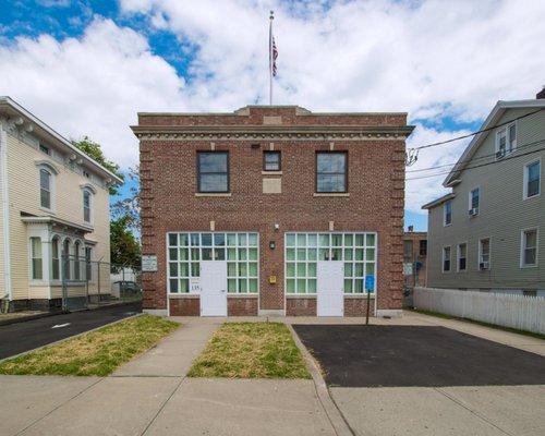 The front of the Firehouse 135 building on 135 Clarence Street, Bridgeport, CT 06608.