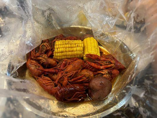 1 lb of crawfish with Cajun seasoning