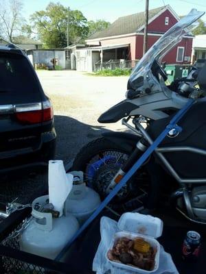 The only way to eat... On your trailer in the shade of a tree in the parking lot... But delicious