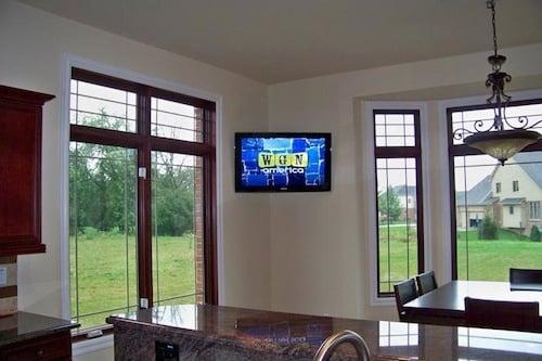 CWC Smart Home Specialists - TV mounted in kitchen