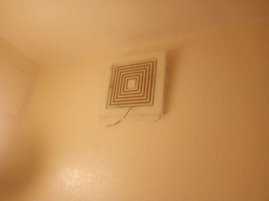 Vent hanging off the wall