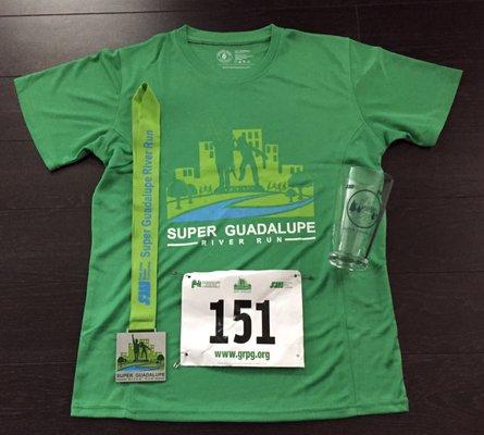 finisher's tech t-shirt, medal, bib, and age group winner's beer glass