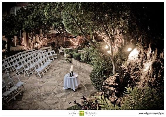 Outdoor ceremony space with waterfalls.