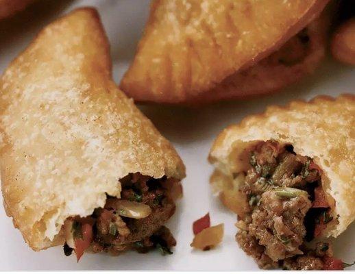 Authentic Homemade Puerto Rican empanadas (made fresh daily- beef chicken pork sausage & other