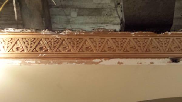 Crown molding being restored