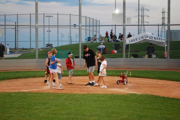 Youth on the Arvada Colts home field at Long Lake Ranch in Arvada