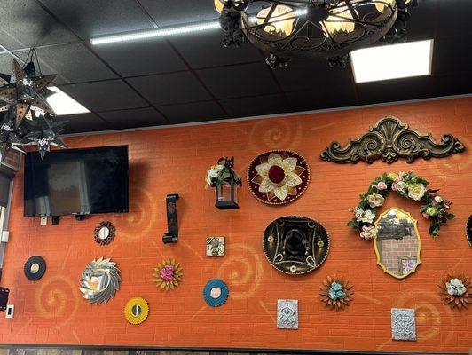 Wall of colorful sombreros and knickknacks