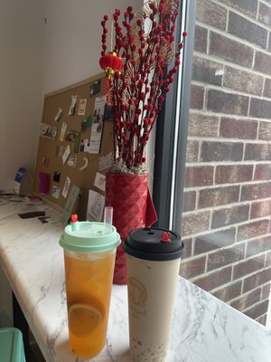 Combo jasmine fruit tea and Asian brown sugar milk tea with crystals boboa.