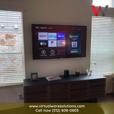 Take a look at this wall-mounted TV and in-wall cabling.