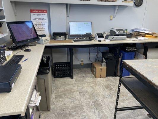 UPS and USPS processing area, tracking, insurance and overnight service.
Package scanning of UPS drop offs.