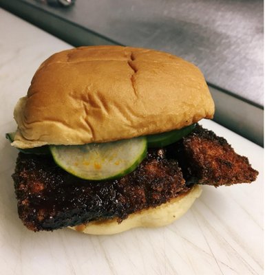 SPECIAL: Fried Chicken Sandwich Rubbed with Indonesian spices, coated in panko and fried. Served with house-made pickles and sweet soy