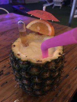 Pineapple pina colada from tiki bar near by.