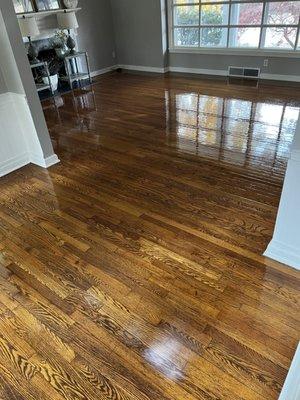 This wood floor space was scrubbed and rejuvenated with a water based finish.