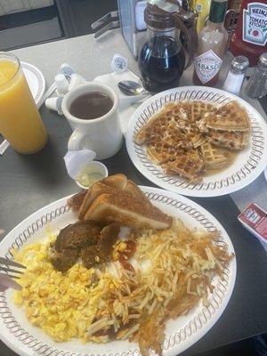 Sausage eggs scrambled with cheese and onions, waffle and hash browns