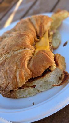 Croissant breakfast sandwich with ham