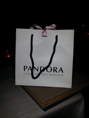 How beautiful is the bag. The pink ribbon is very elegant