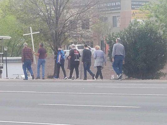 Carrying the cross on main Street in hurricane