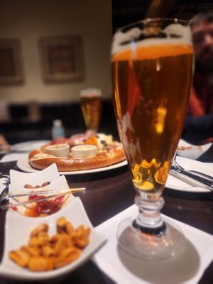 Beer and a pretzel and cheese board