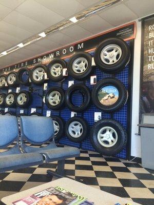 Basic waiting room and wall of tires