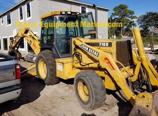 2000 John Deere 710D 4 wheel drive Backhoe / Loader