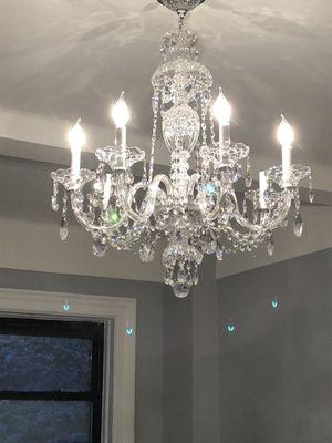 Crystal chandelier master bedroom