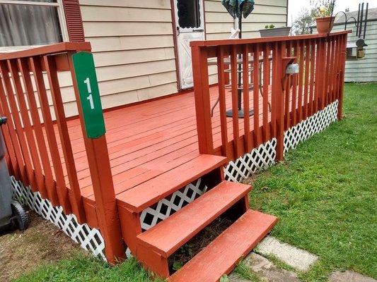 Deck board repair, fresh paint, new lattice