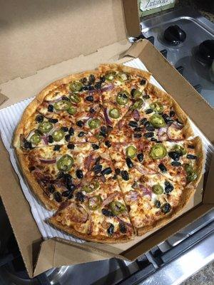 Thin crust (parmesan), black olives, onions, and jalapeños