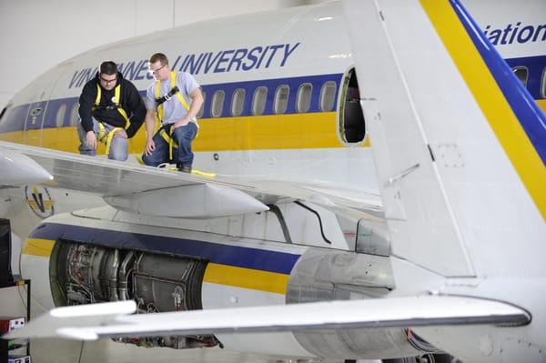 On the wing of our Boeing 737.  Learn Aviation Maintenance from the best instructors with the best technology.