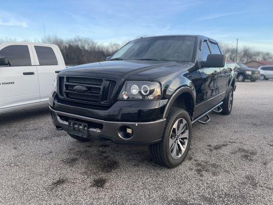 Our beautiful black beast (before the big jacked-up new tires)