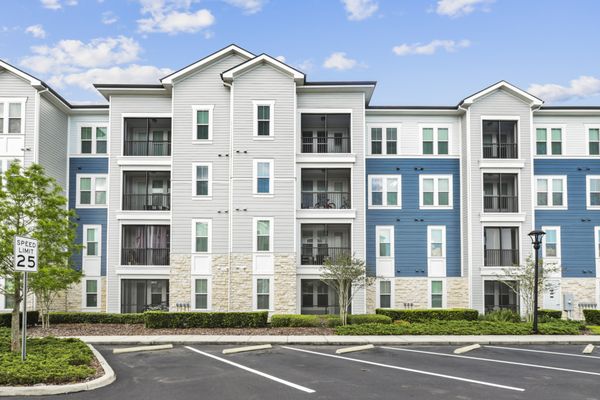 Image of the colorful blue, cream, and grey exterior of Lantower Asturia.