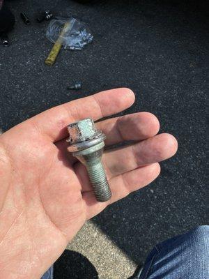 Old OEM lug nuts that this shop thankfully were able to remove for me.