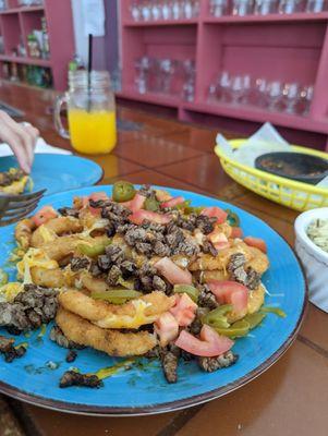 Carne asada onion ring "nachos"