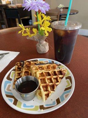 Heavenly Waffles with syrup and creme brûlée iced coffee.