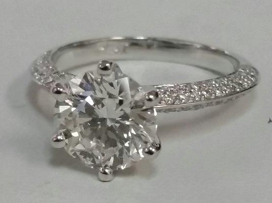 Custom made pave diamond solitare