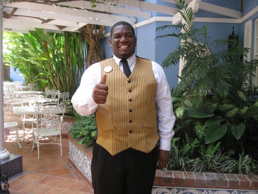 Meet "Curtis, the Butler"; his most frevent hope is to make your vacation "amazing".